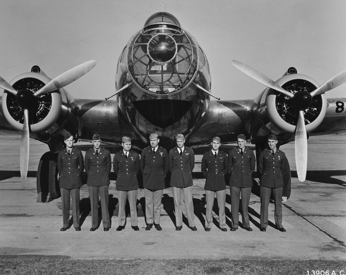 Military Men Standing in Front of Plane