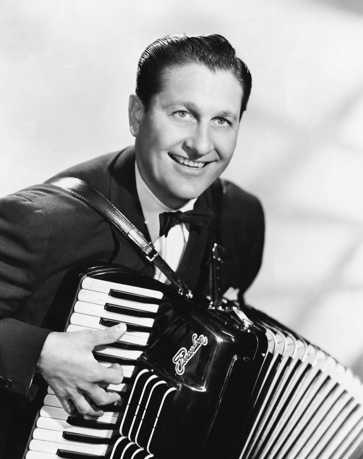 Musician Lawrence Welk Playing an Accordion
