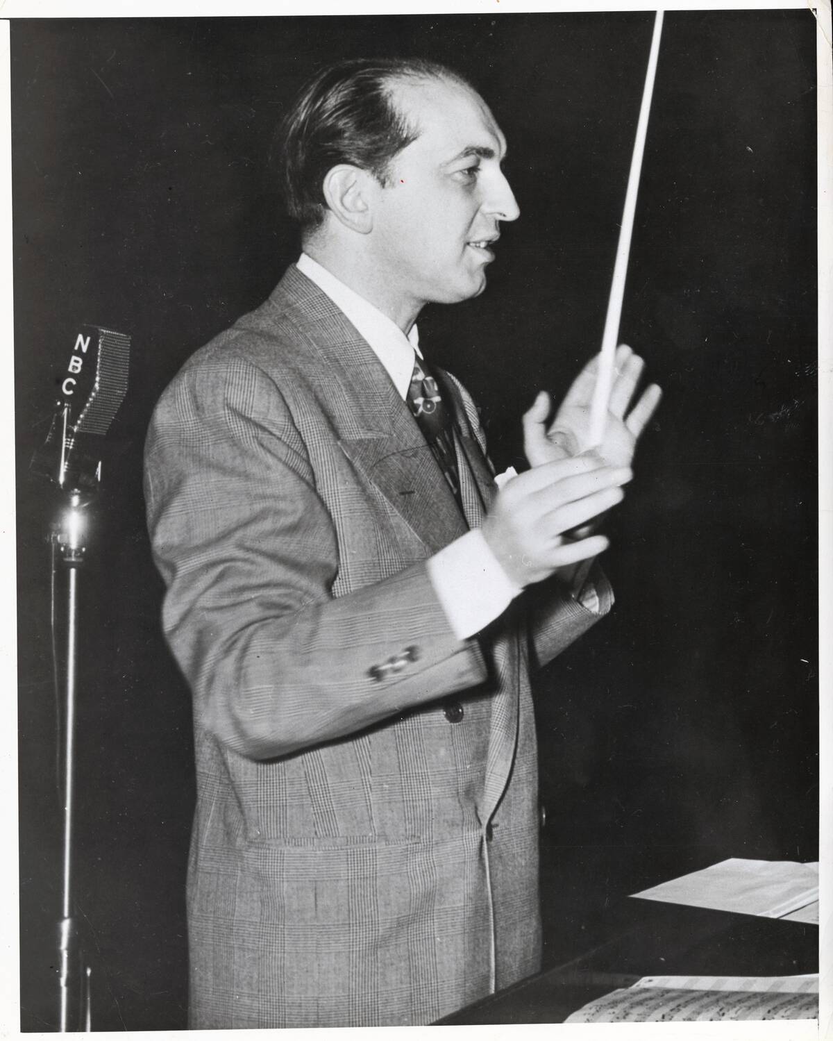 Percy Faith Conducting Orchestra on Set