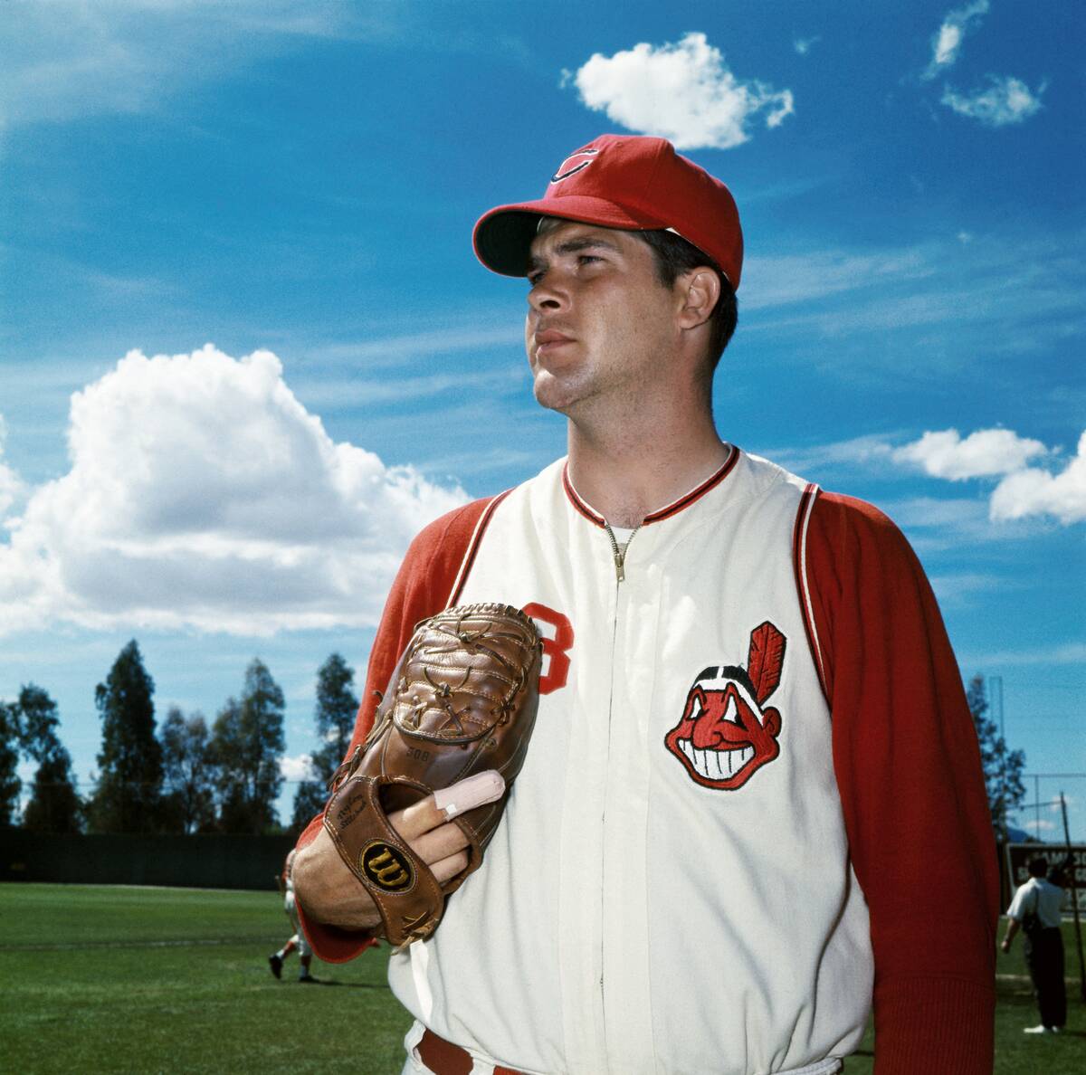 Sam McDowell Posing in Uniform and Holding Baseball Mitt