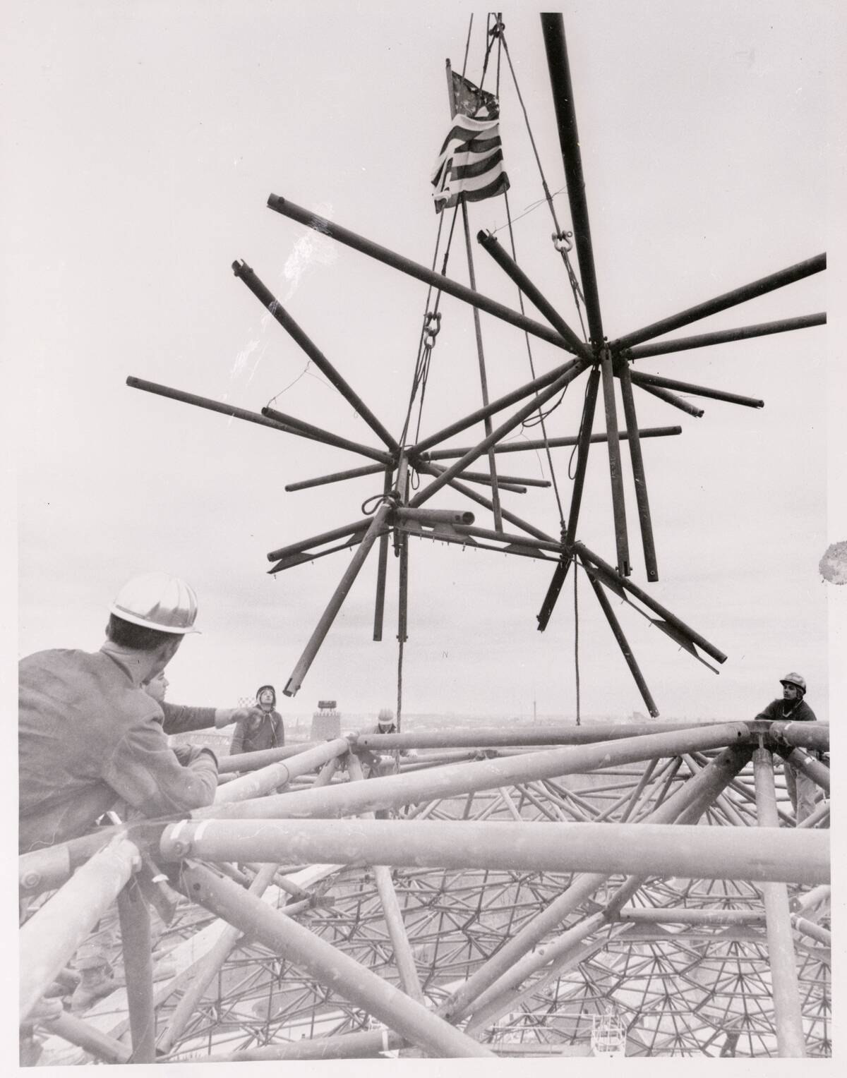 Steelworkers Raising an American Flag