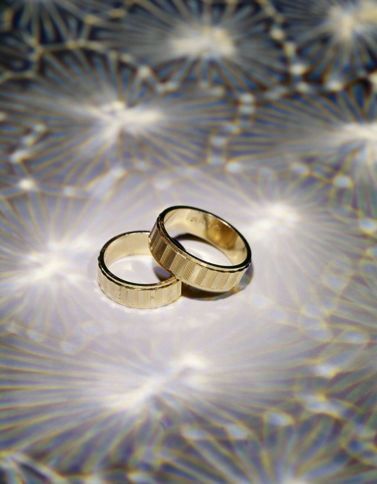 TWO GOLD WEDDING RING...