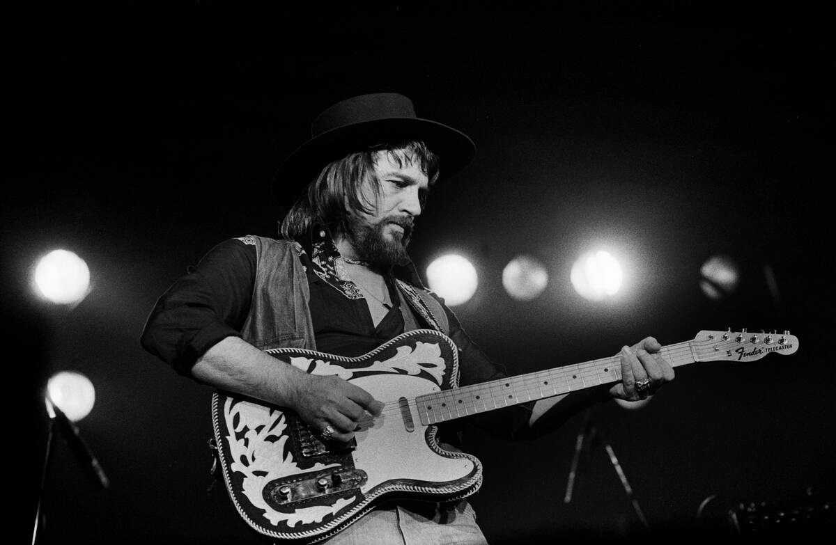 Waylon Jennings Performs Onstage