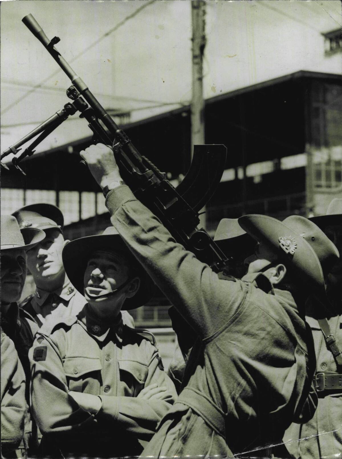 A digger using a Bren gun as an anti aircraft weapon.