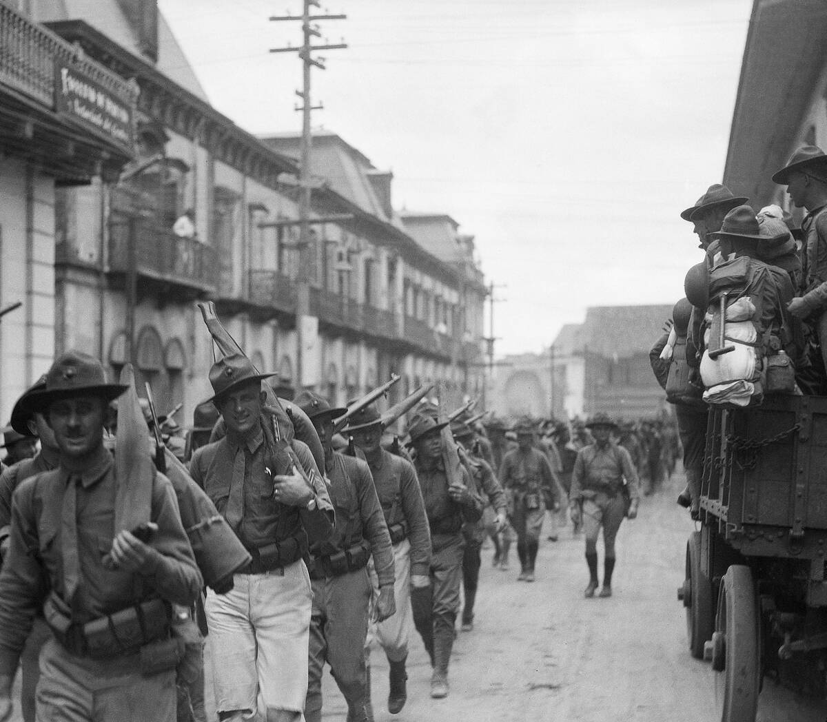 American Soldiers March Through Street