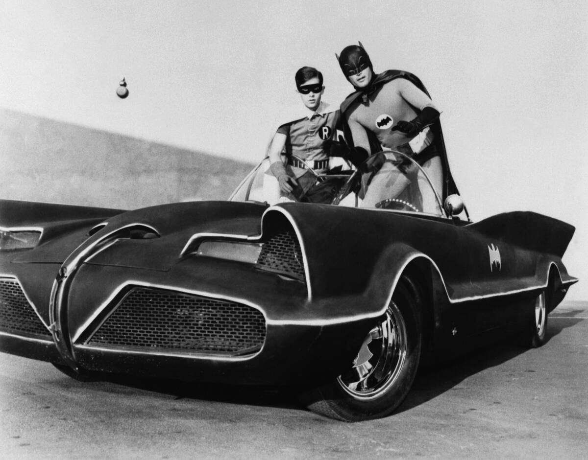 Batman and Robin in the Batmobile