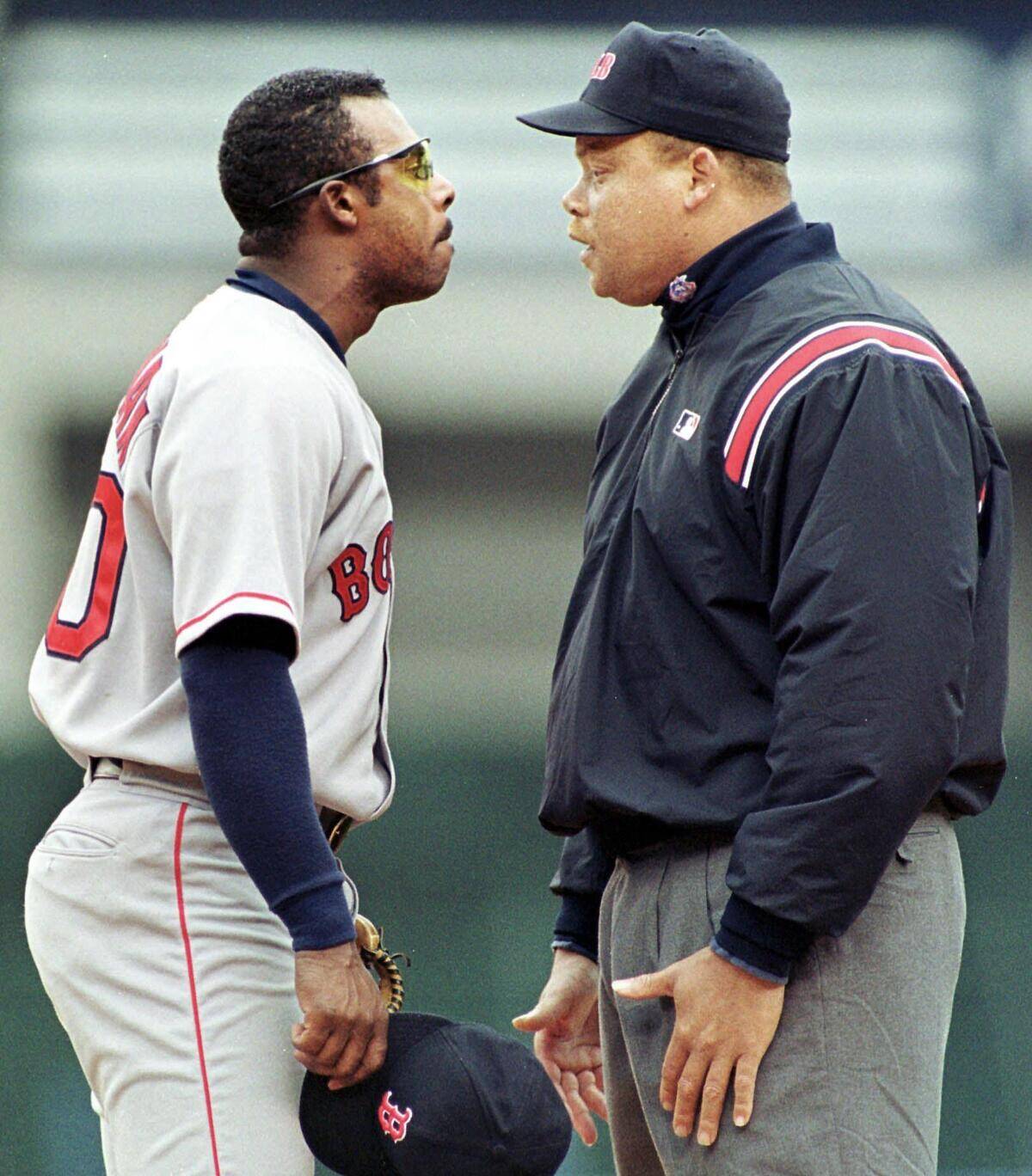 Boston Red Sox first baseman Jose Offerman (L) get