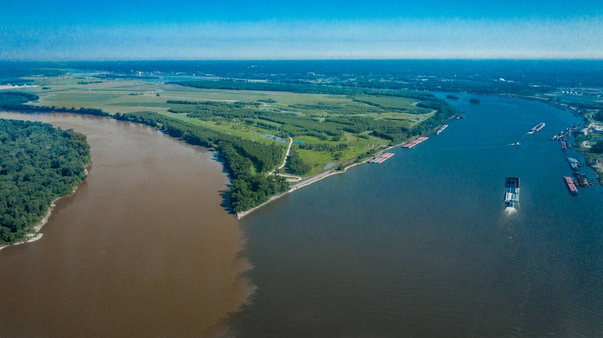 Confluence of Missouri. (left) and Mississippi (Right) rivers near St. Louis Mo. and Alton, Illinois view from Drone shows barges