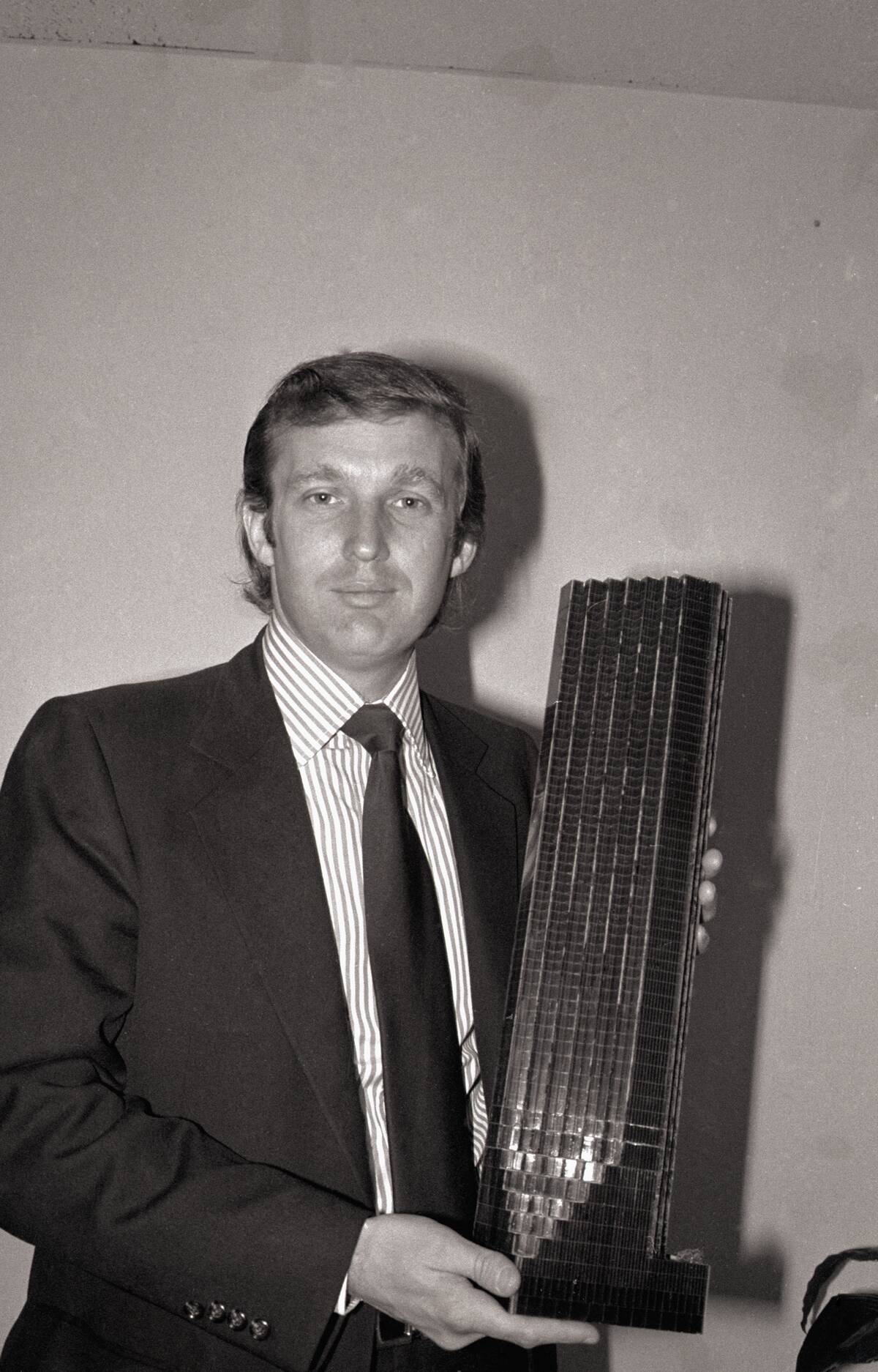 Donald Trump Holding Model of Tower