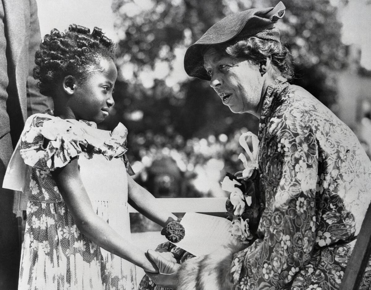 First Lady Eleanor Roosevelt Conversing with Young Girl