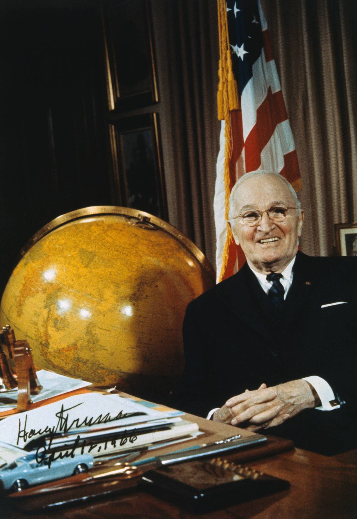 Harry Truman in His Office Smiling