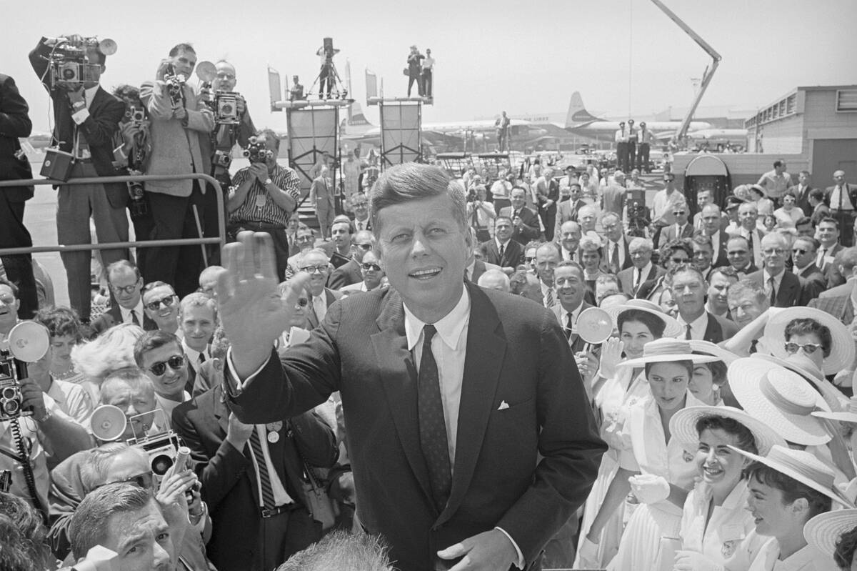 John F. Kennedy Greeting Crowd