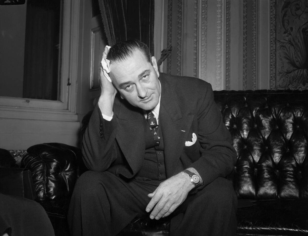 Lyndon B. Johnson Wiping His Forehead