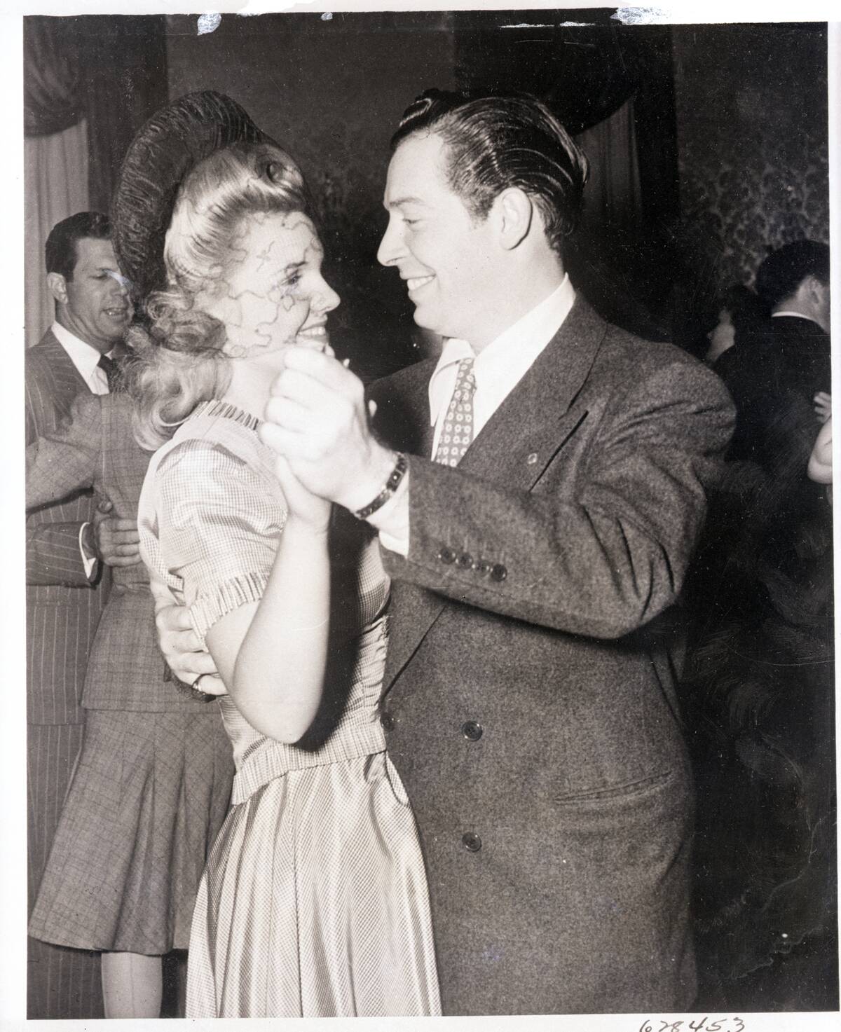 Milton Berle and Joyce Matthews Dancing