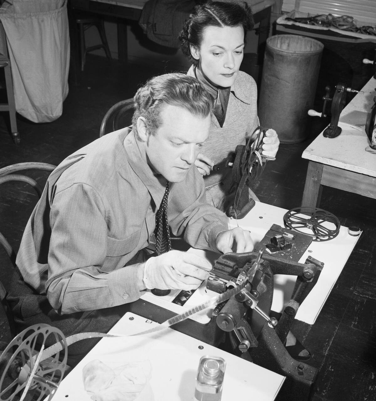 Movie Star Splicing Film with Assistant