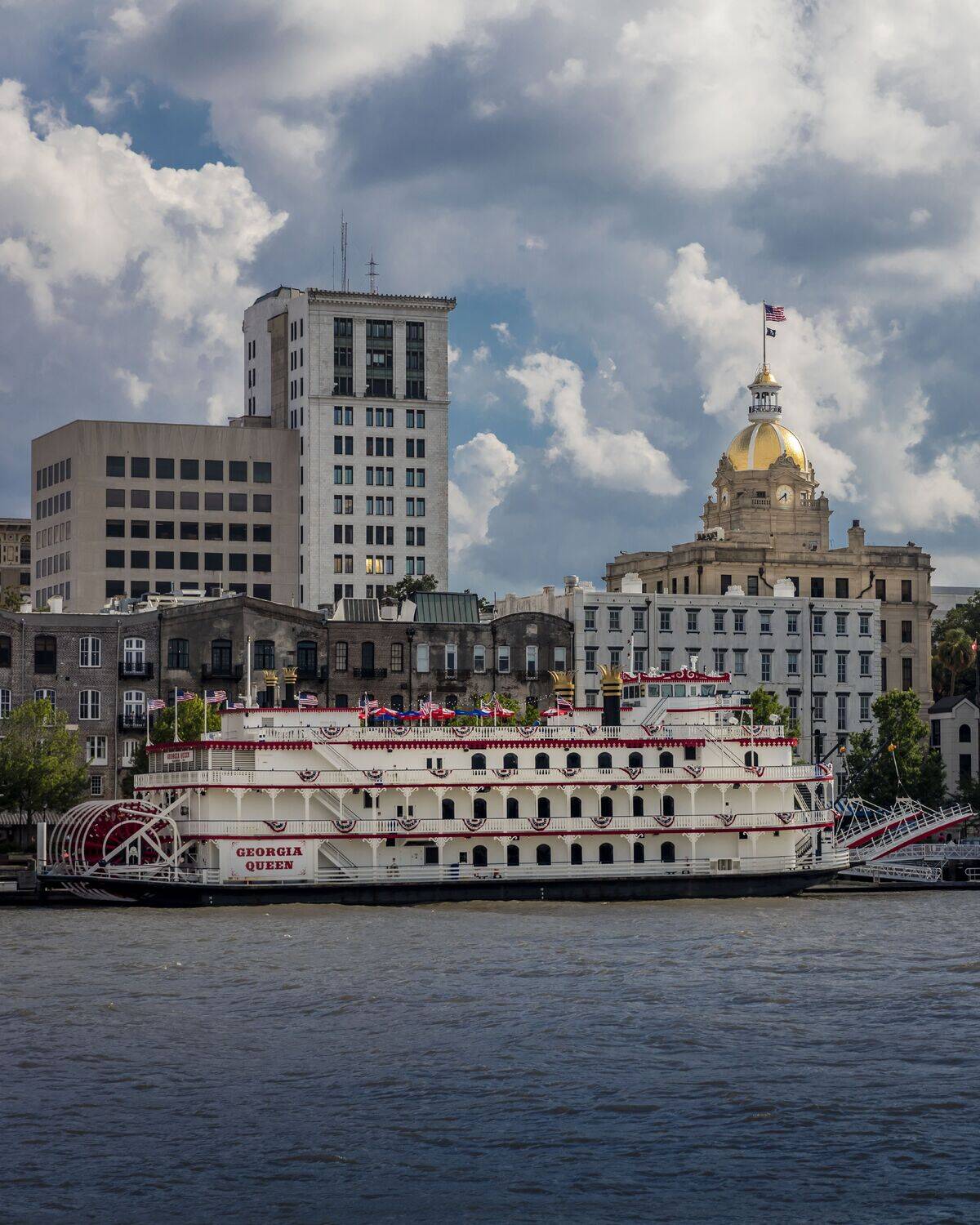 Scenic and historic Savannah Georgia River features Georgia Queen Riverboat