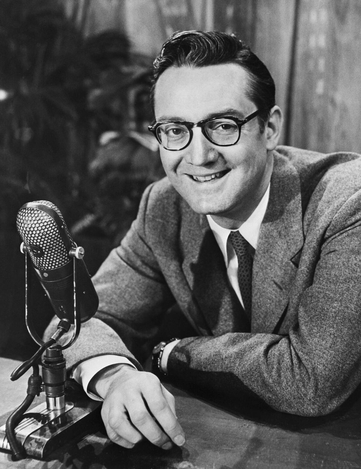 Steve Allen Sitting at Microphone