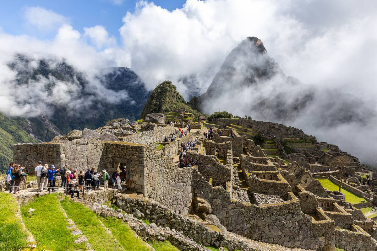 View of tourists on the Machu Picchu archaeological site...
