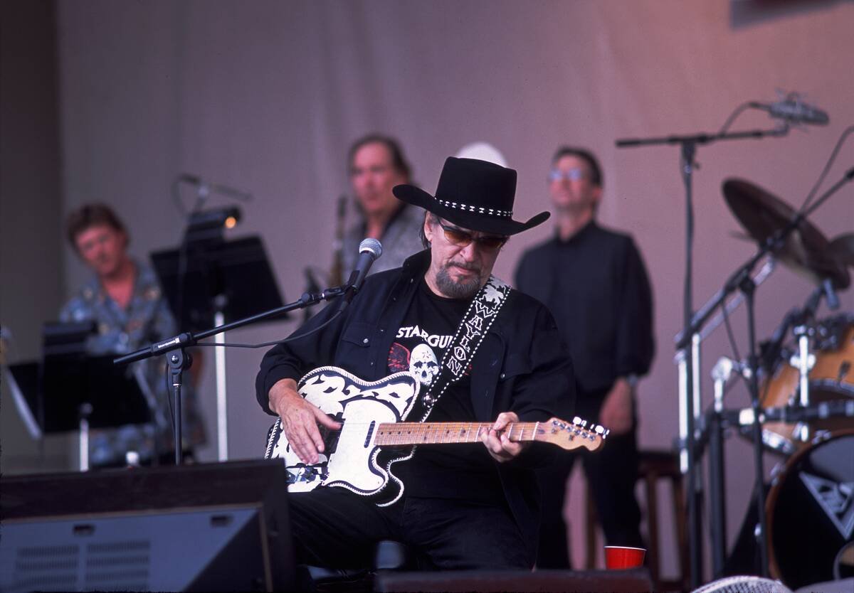 Waylon Jennings Performs Onstage