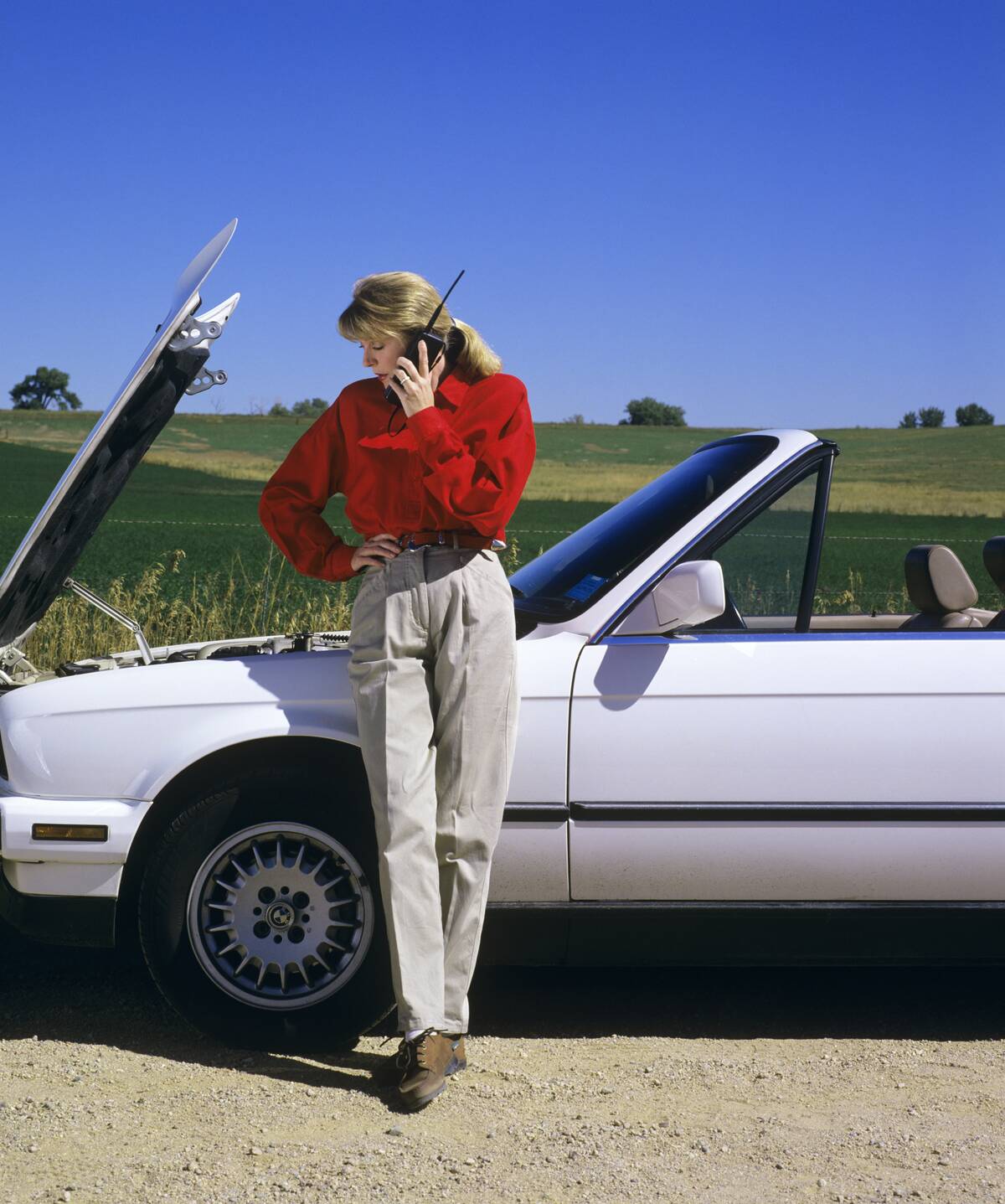 1990s Woman With Car Troubl...