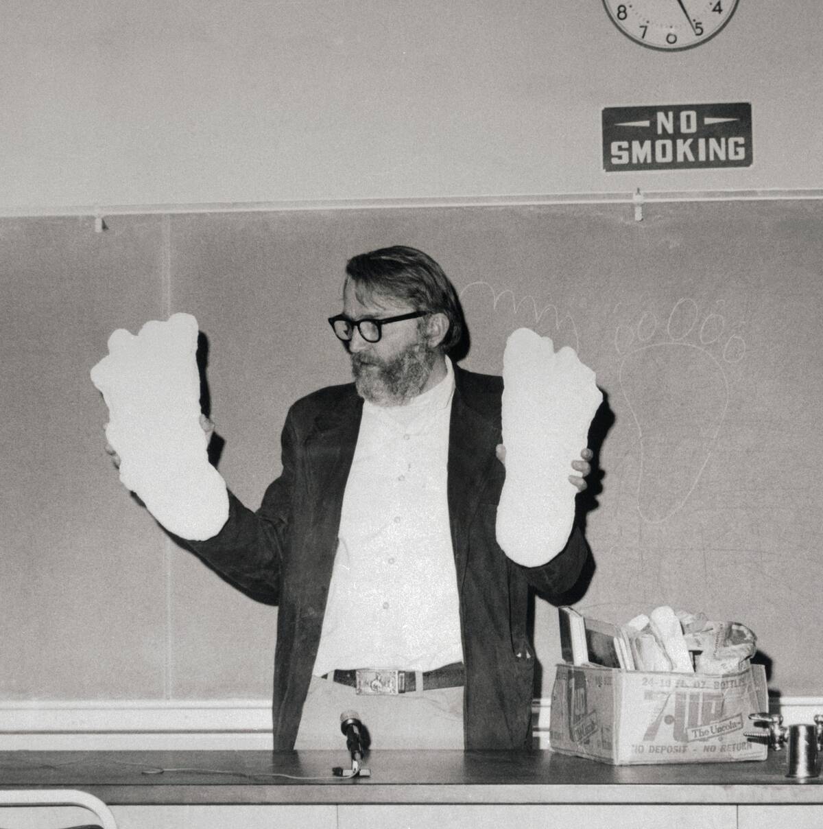 Anthropologist Grover Krantz Holding up Sasquatch Prints