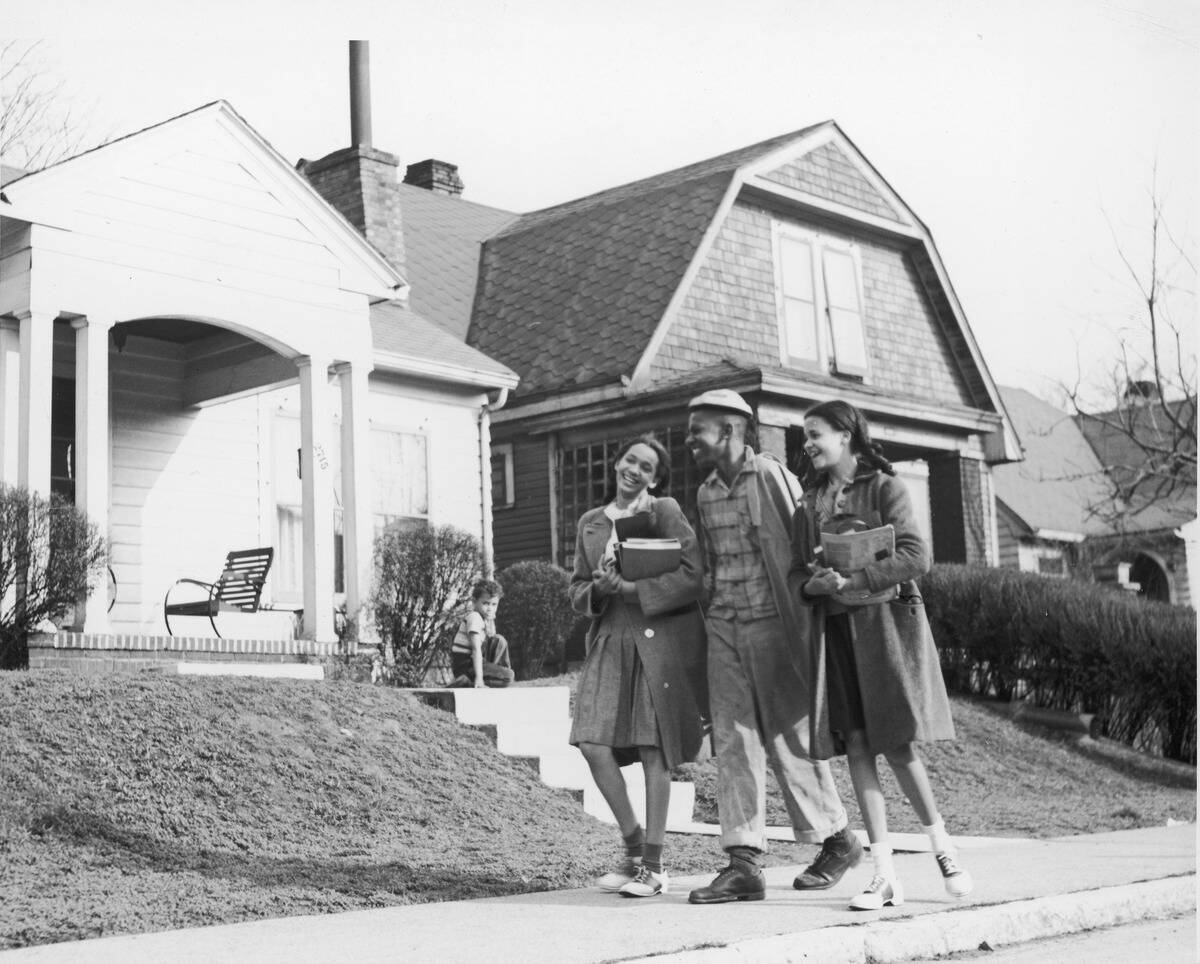 Black Teenagers Walking With Schoolbooks, 1950s.