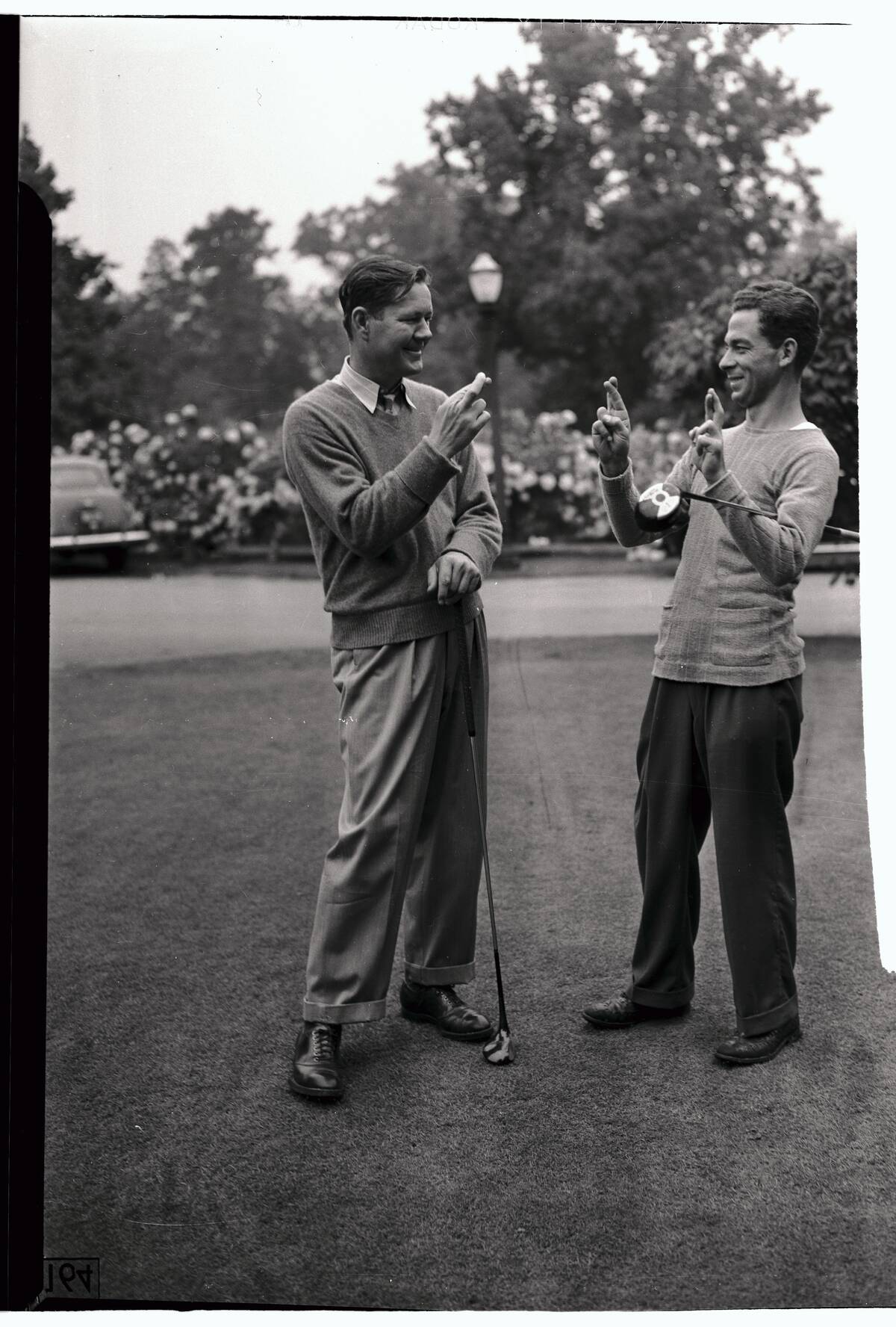 Byron Nelson and Eddie Kirk Crossing Their Fingers