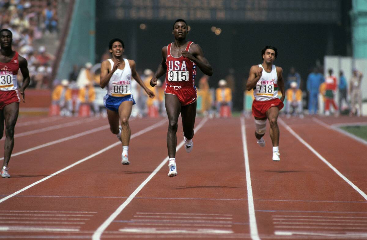 Carl Lewis Running In A Race At The Los Angeles Olympics
