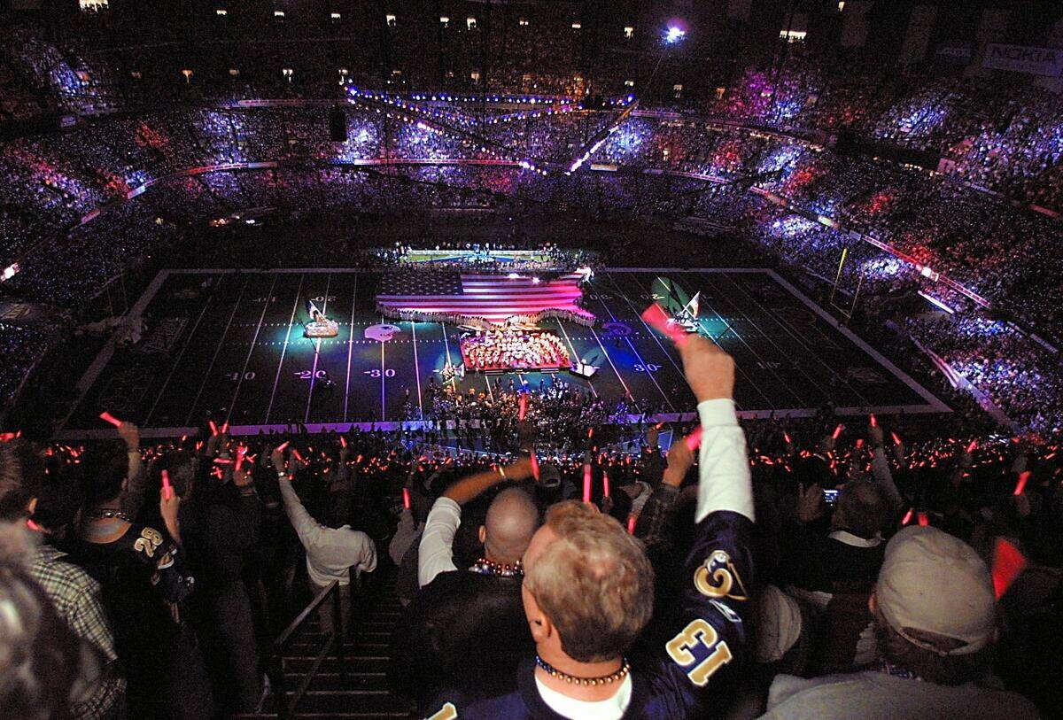Fans participate during the pre-game program 03 Fe