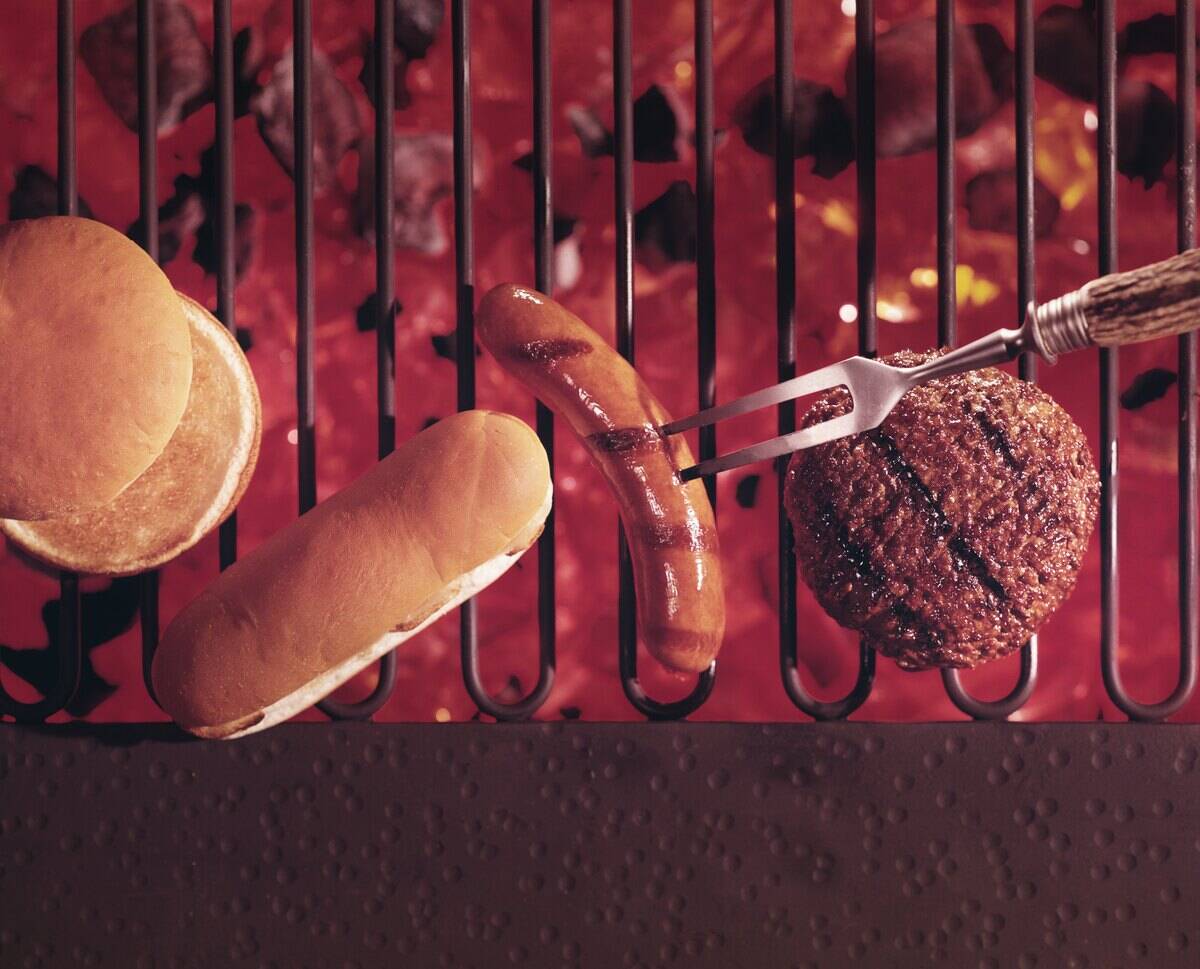 Hamburger And Hot Dog On The Grill