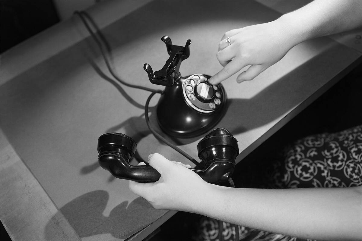 Hands Dialing Phone