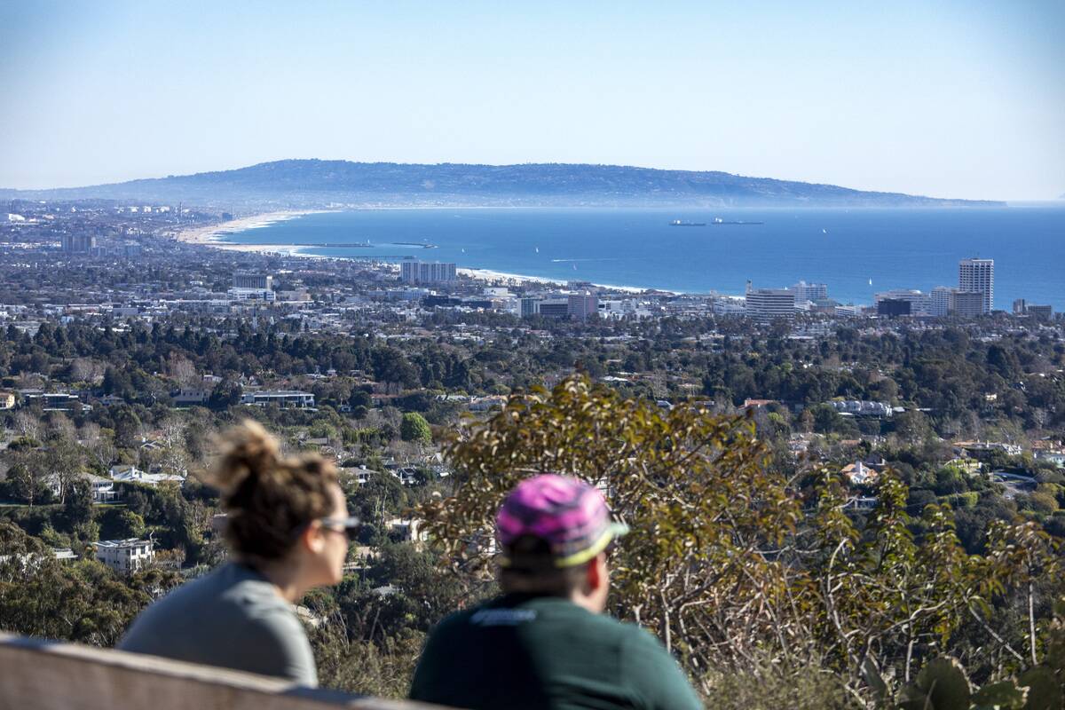 Hikers take in the view of Santa Monica Bay from Inspiration Point...