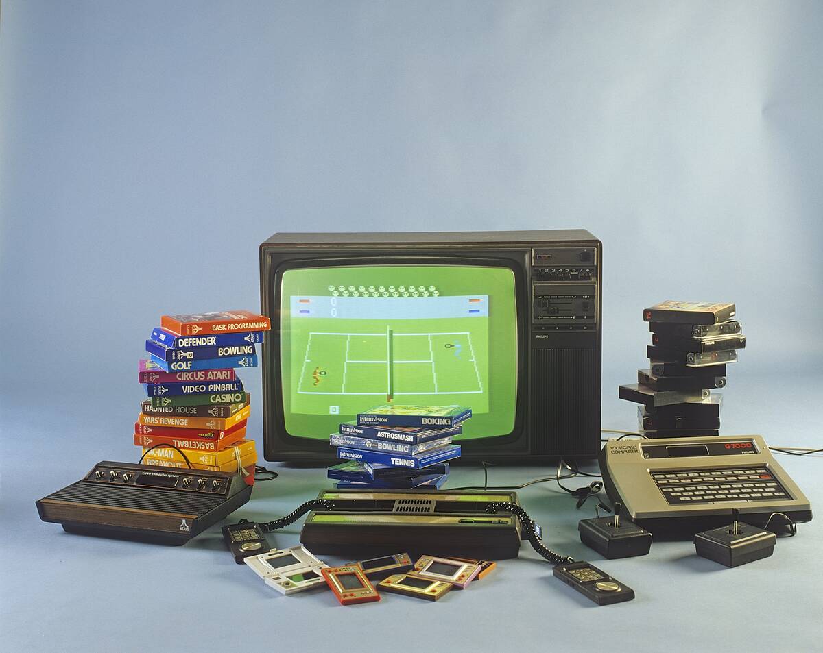 Home video games in the 1980s. A selection of the most popular game entertainment products in front of...