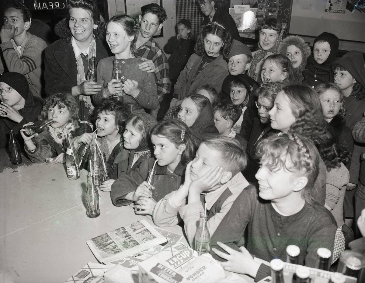 Kids Watch Tv In Candy Store/Soda Parlor