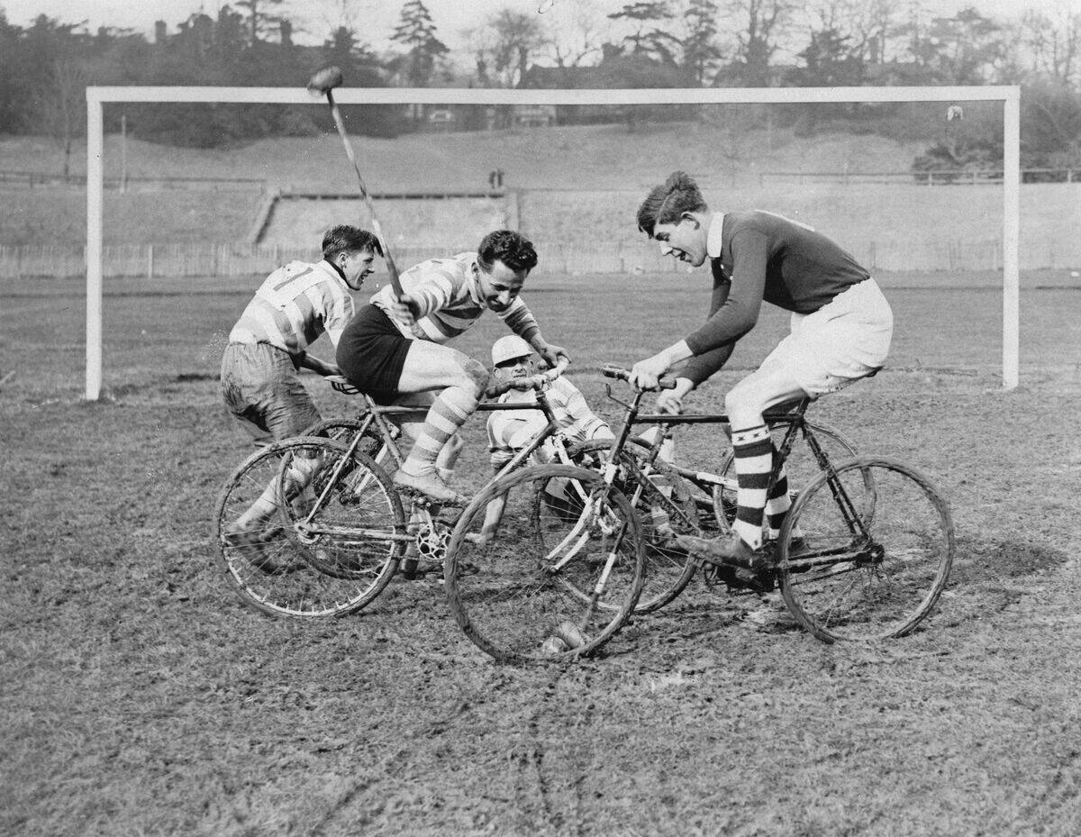 Playing Polo on bikes. England. Photograph around 1930. (Photo by Austrian Archives (S)/Imagno/Getty Images)