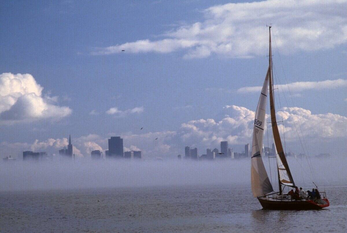 Sail Boat And Skyline With Fog