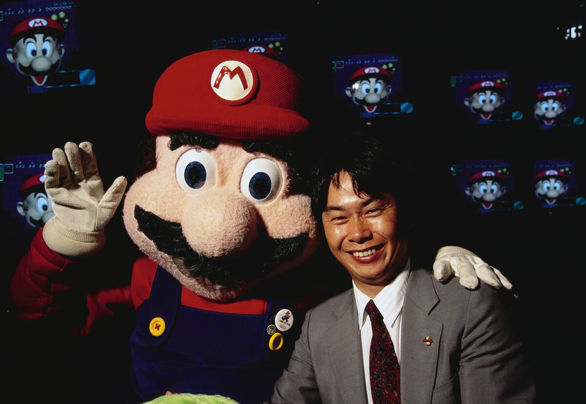Shigeru Miyamoto with Mario