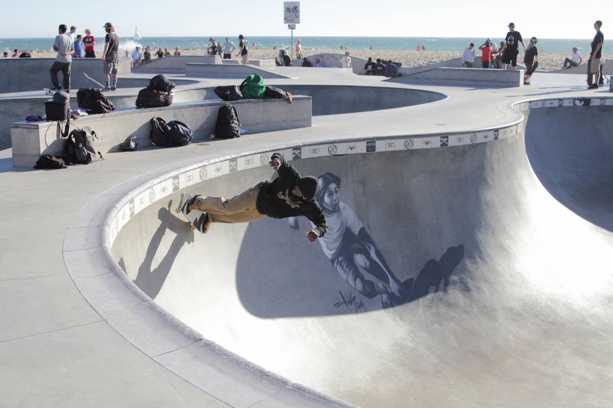 Skateboarder At Skate Park