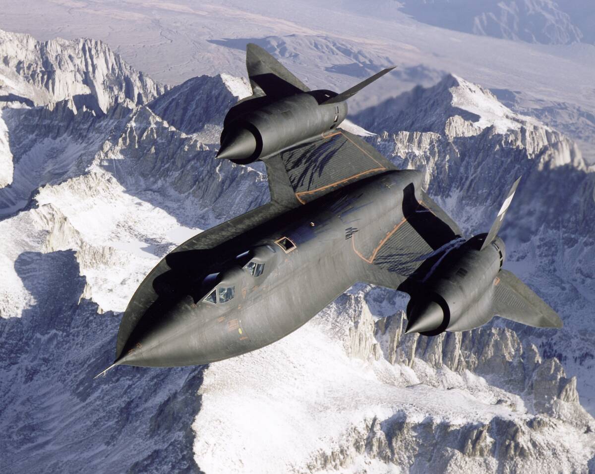 Sr-71 Over Snow-Capped Mountains