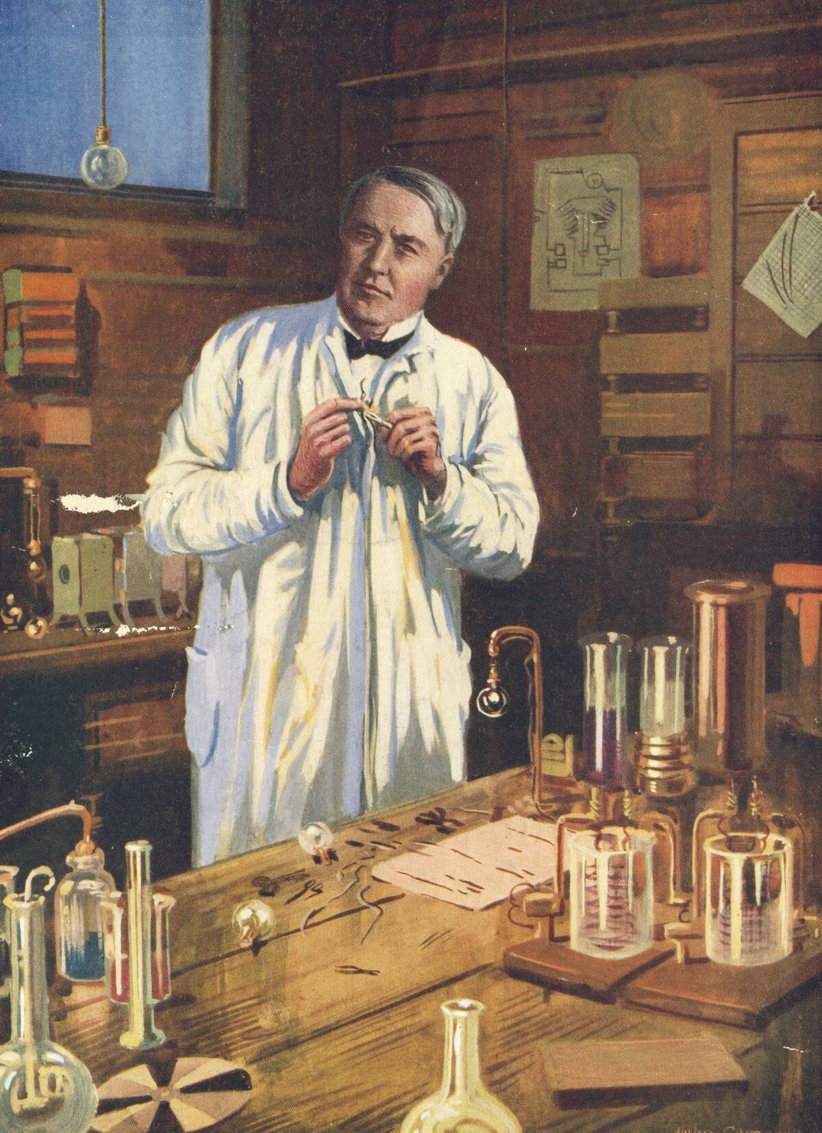 Thomas Alva Edison (1847-1931) American inventor, at work on incandescent light bulbs in his laboratory at Menlo Park.