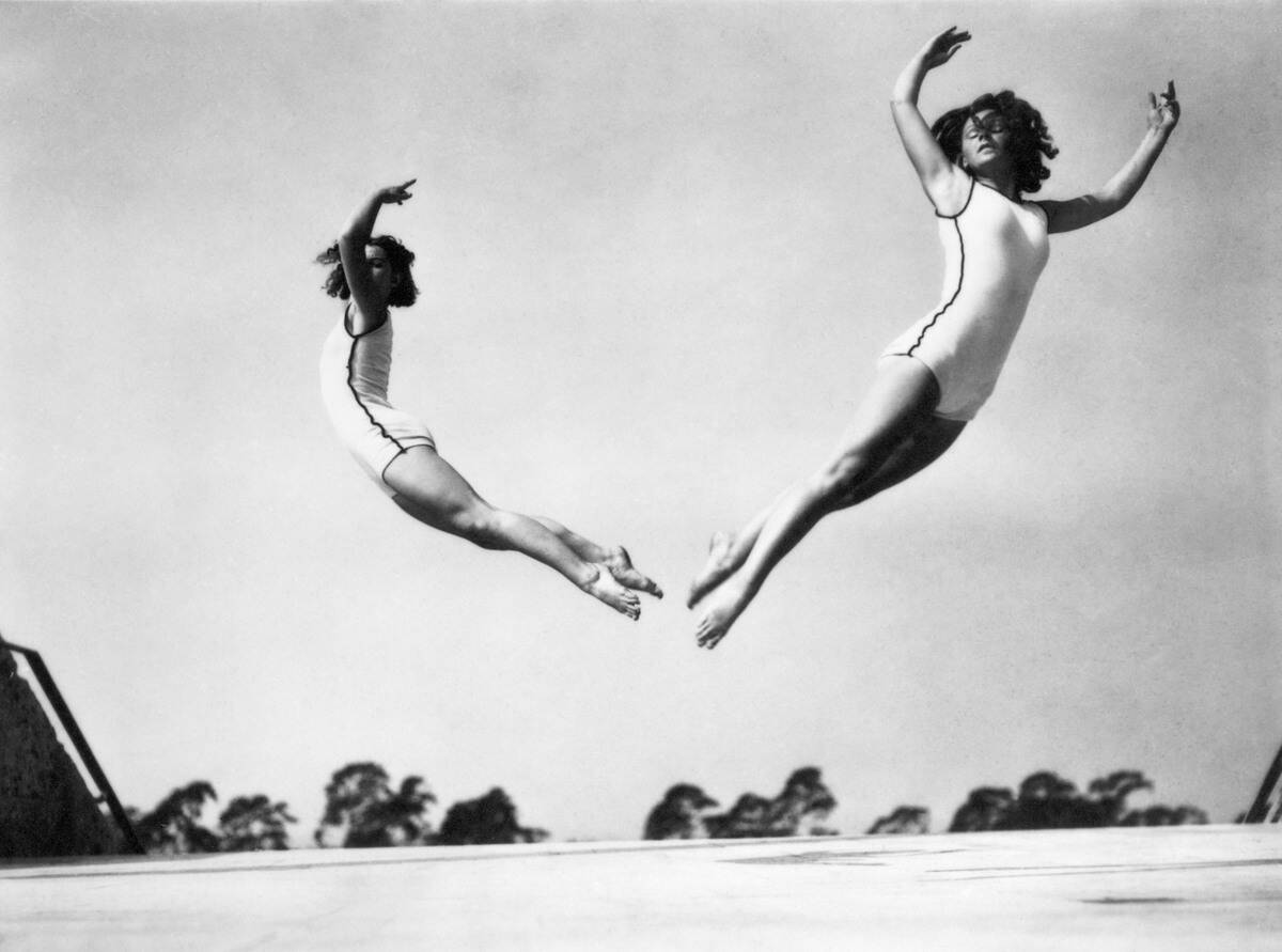 Two gymnasts, c 1935.
