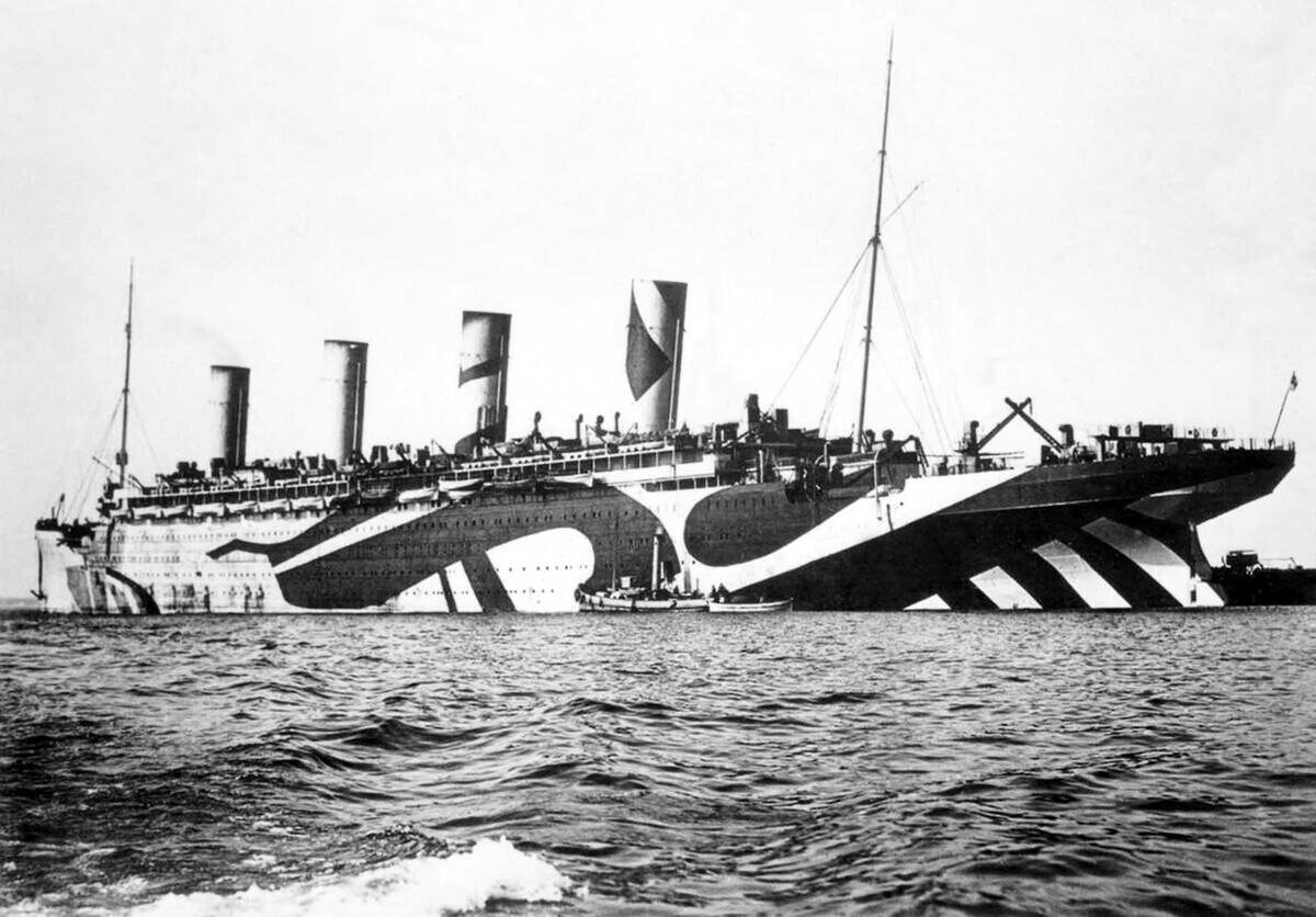 UK: HMT Olympic in dazzle camouflage while in service as a troopship during World War I, c. 1914-1918