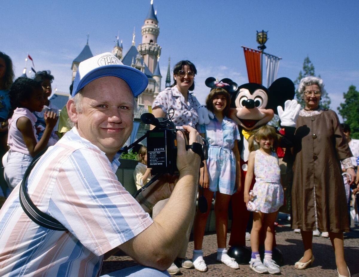 Video Camera Records Family At Disneyland