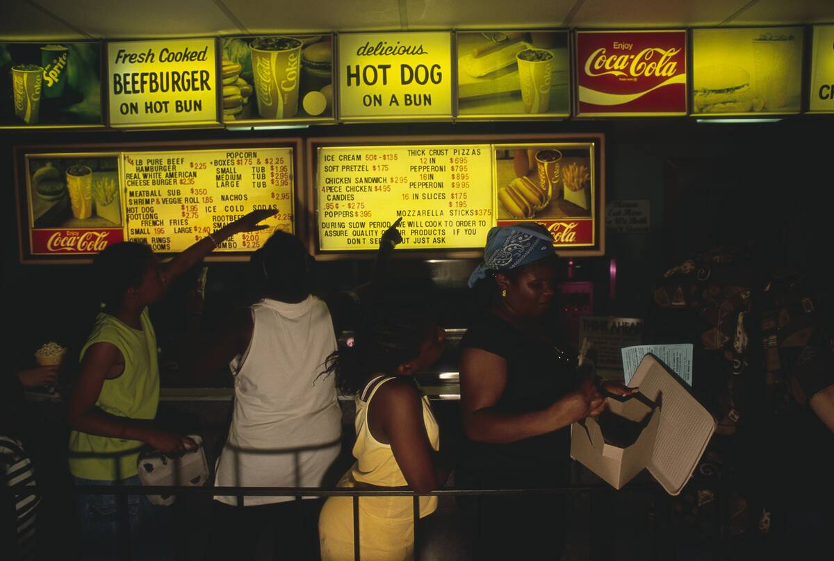 Women Ordering Food at Drive-in Theater