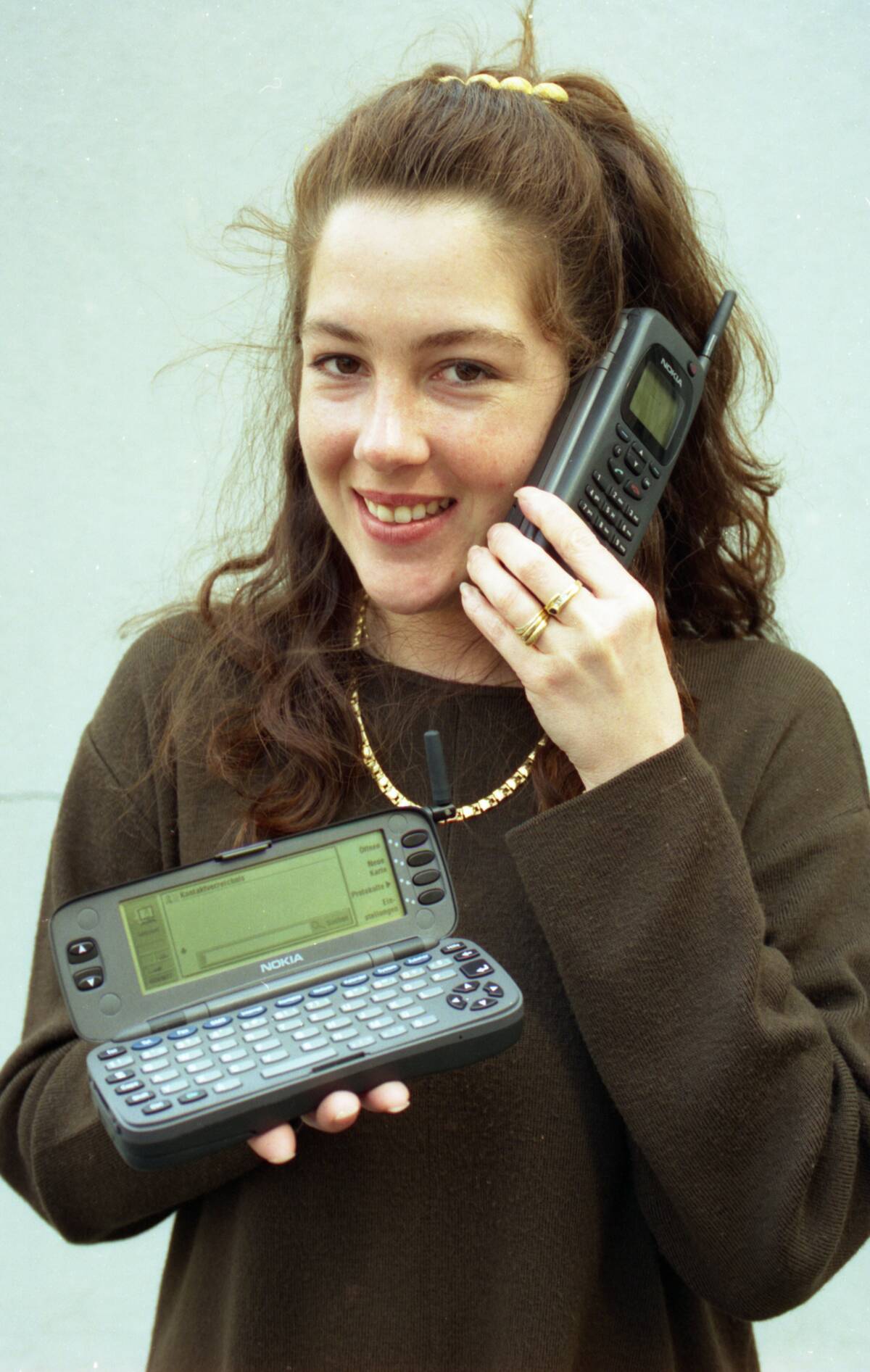 Young woman with Nokia Natel-D mobile phone 1994