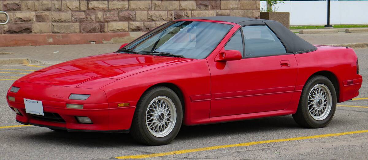 1989_Mazda_RX-7_Convertible_in_Blaze_Red,_Front_Left,_07-08-2023