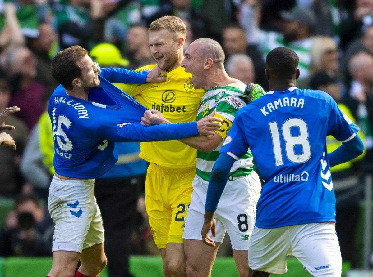 31/03/19 LADBROKES PREMIERSHIP .CELTIC v RANGERS.CELTIC PARK - GLASGOW .Celtic goalkeeper Scott Bain comes between Scott Brown (right) and Andy Halliday