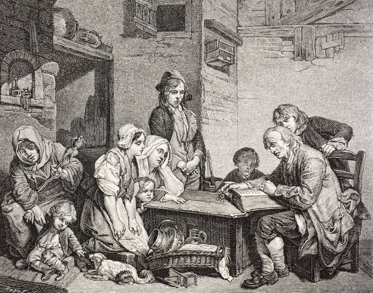 A Poor Family Gathers Around As The Father Reads From The Bible