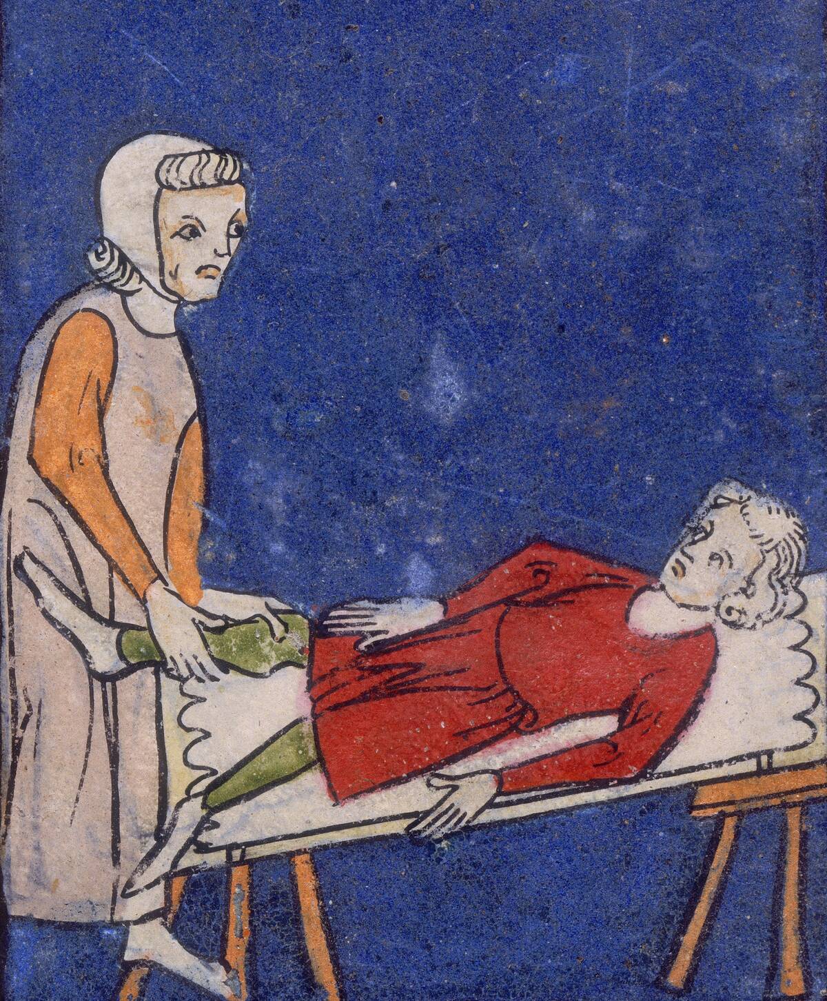 A Woman Setting A Bone In A Boys Leg