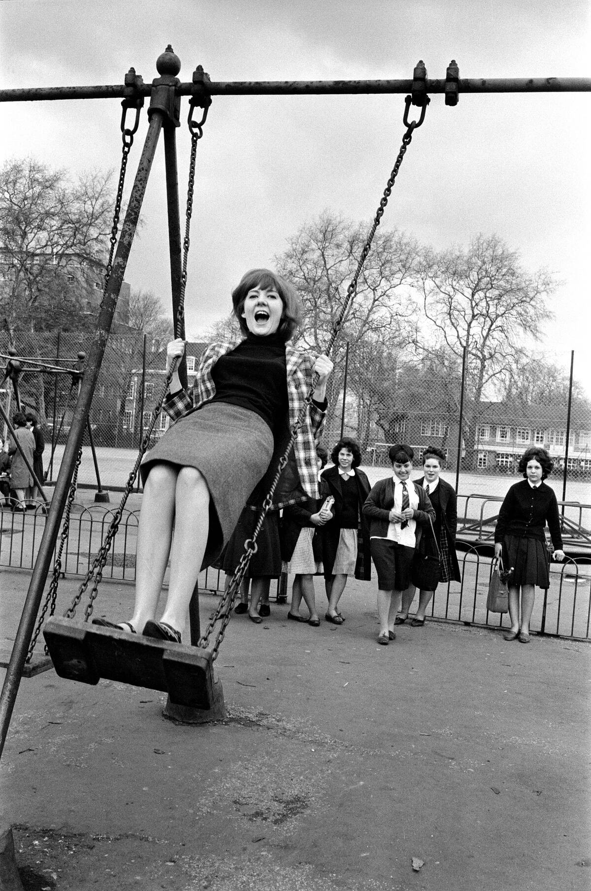 Cilla Black at a playground in May 1964
